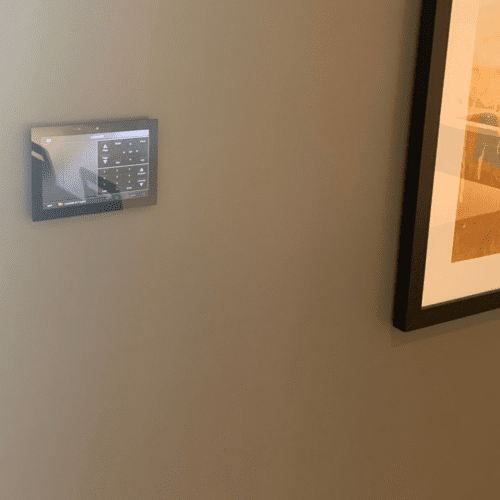 A digital device mounted on the wall